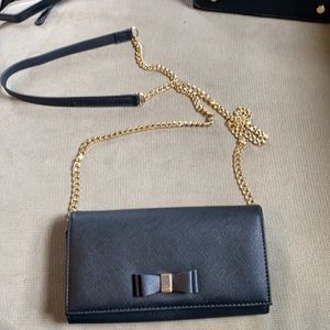 Crossbody black clutch bag with bow